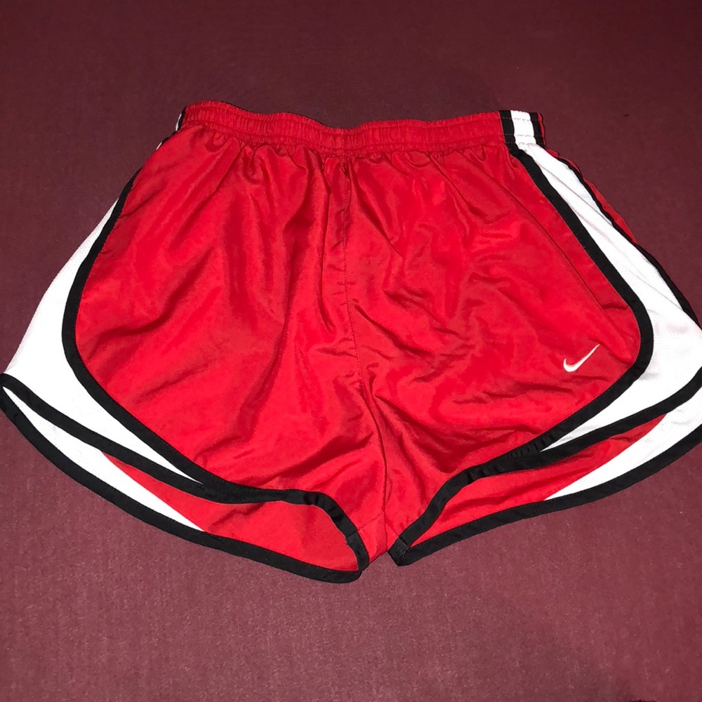 Red Nike shorts